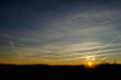 © dimas830 - Morning sky landscape with traces from an airplane in germany