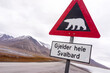 © Cavan Images - Signpost Warning Drivers To Beware Of Polar Bears Crossing The Road