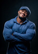© Vadim - Lifestyle macho man in studio. Fashionable young guy with athletic body.