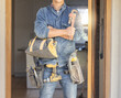 © Lumeez/peopleimages.com - Handyman, tool bag and arms crossed at work with goals, property development and real estate maintenance. Construction worker, tools and renovation industry with service, vision and home improvement