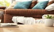 © hook_rv - Wood tabletop blurred modern cozy living room. Ai generated.