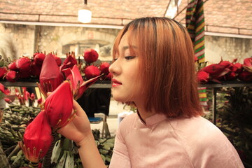 beautiful young Vietnamese girl enjoy Tet holiday 