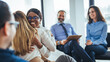 © Dragana Gordic - African American and Asian women embracing at group therapy session, empathy concept, psychological support, diverse friends overcome problem together, addiction treatment or team building close up
