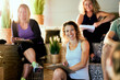 © Flamingo Images - Group of people talking in gym