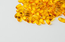 Close-up On Omega Fish Oil Pills On White Background With Free Space For Text