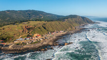 Horizontal Photo From Drone From The Sea Towards The Fishermen Cove In The City Of Boyeruca Sexta Region, Chile
