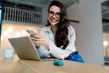 Sticker - Glad young woman using modern devices