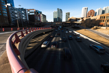 A landscape view of traffic on the freeway near downtown Chicago at dusk