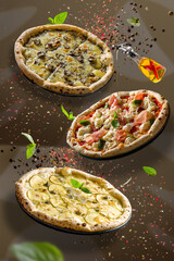 Wall Mural - levitate pizza with oil basil and spices, concept for social media and banners