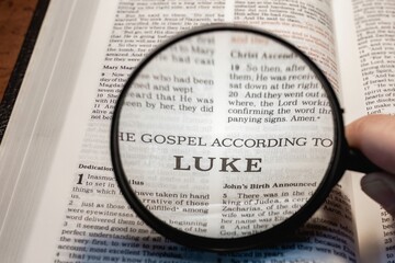 Canvas Print - title page book of Luke close up using magnifying glass in the bible for faith, christian, hebrew, israelite, history, religion, christianity, new testament
