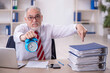 © Elnur - Old male employee in time management concept