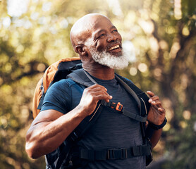 Canvas Print - Nature, fitness and black man hiking with a backpack in a forest for exercise, health and wellness. Sports, athlete and happy senior African male hiker trekking in the woods on an adventure trail.