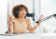 © Rene La/peopleimages.com - Radio show, podcast and black woman with microphone, talking and live streaming for advice. African American female presenter, lady or influencer with headphones, discussion or broadcast in workplace