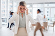 © Sharne T/peopleimages.com - Motion blur, business woman in office and headache, pain and anxiety with fast pace corporate life, stress and burnout. Mental health, migraine and frustrated with movement, speed and overwhelmed