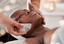 Black Woman, Gua Sha Massage And Luxury Face Treatment Of A Young Female With Spa Facial. Skincare, Rose Quartz Tool And Beauty In Wellness Clinic With Client Feeling Calm And Zen From Dermatology