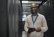 © Kirsten D/peopleimages.com - Data center, tablet or black man portrait or technician for system cybersecurity code in server room. Happy, face or male programmer or programming in information technology or digital transformation