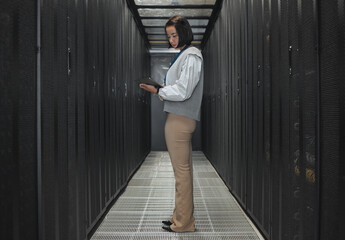 Wall Mural - tablet, server room and programming with a developer asian woman at work on a computer mainframe. so