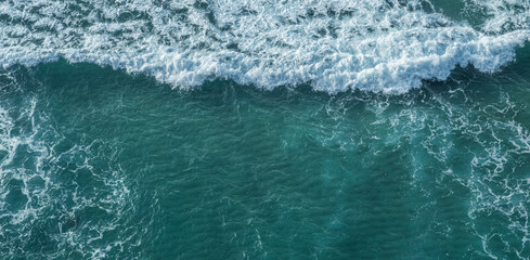 Wall Mural - ocean foamy pattern on water surface. top view.
