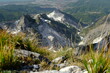 Carrara quarry. Marble quarries of the Apuan Alps.Panorama of the mountains with greenery over the city of Carrara. Carrara, Tuscany, Italy
