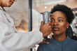 © Coetzee/peopleimages.com - Face, eye exam or black woman consulting doctor for eyesight at optometrist or ophthalmologist. African customer testing vision with hands of optician helping or testing iris or retina visual health