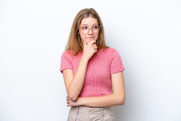 Wall Mural - Teenager Russian girl isolated on white background having doubts and thinking