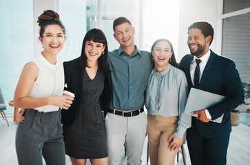 Wall Mural - Happy, group and portrait of laughing business people together for meeting, working and teamwork. Smile, hug and corporate employees in an office for bonding, collaboration and happiness as a team