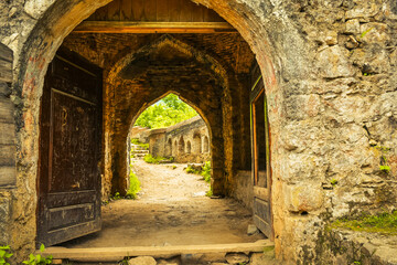  Old gate to Rudkhan castle in north east Iran - popular famous tourism destination in Persia