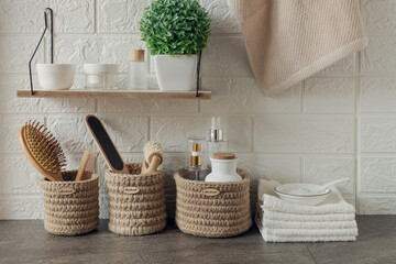 bathroom interior with wicker baskets and accessories for skin and body care, eco friendly concept
