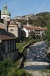 Pontremoli. Bridge over the river in Pontremoli.The Magra River in Lunigiana with houses and the church. Lunigiana, Tuscany, Italy