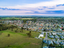 Drone View Over Edge Of Suburbia To Countryside Edge Of Urban Development