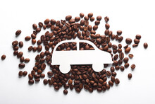 Paper Cut Car With Coffee Beans On White Background