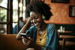 © ARThitecture - Young beautiful african american woman using smartphone in a city. Smiling student girl sitting in a cafe and texting on her phone, generative ai