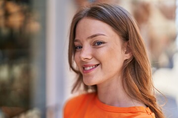 Canvas Print - Young woman smiling confident standing at street