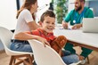 © Krakenimages.com - Family having medical consultation and child holding teddy bear at clinic