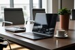 © ParinApril - This is a mockup of a laptop sitting on a table in the office of a computer business in a productive meeting room. Generative AI