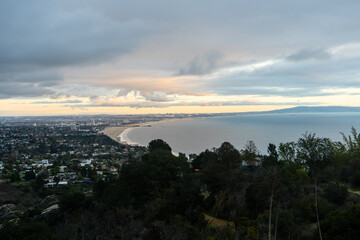 Sticker - Sunset views from the Santa Monica Mountains while hiking, looking down on the city of Los Angeles and the Santa Monica Bay.