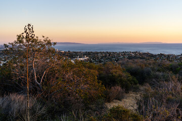 Sticker - Sunset views from the Santa Monica Mountains while hiking, looking down on the city of Los Angeles and the Santa Monica Bay.