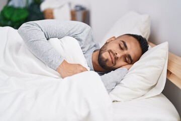 Sticker - Young hispanic man lying on bed sleeping at bedroom