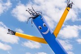 Fototapeta Tęcza - Inflatable Dancing, Flailing Arms Tube Guy, Blue Sky and Clouds