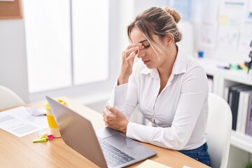 Canvas Print - Young blonde woman business worker stressed using laptop at office