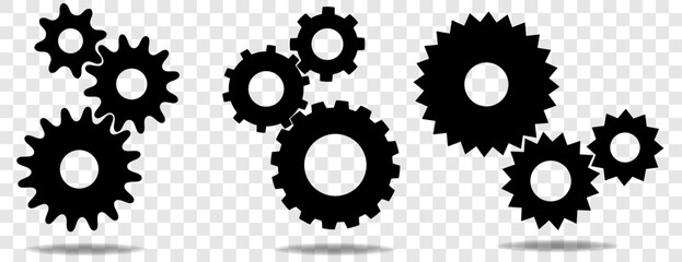 three sets of black cogs (gears) with shadow