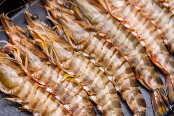 Poster - Fresh raw shrimp on grill pan