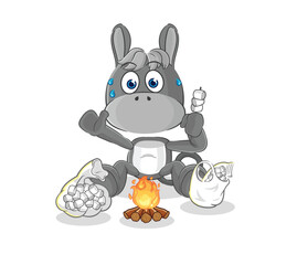 Wall Mural - donkey roasting marshmallows. cartoon mascot vector