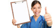 © Maridav - Nurse showing blank clipboard sign smiling giving thumbs up success sign wearing stethoscope and scrubs. Asian Caucasian female nurse or young doctor isolated cutout PNG on transparent background.