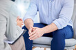 © Lune V A/peopleimages.com - Closeup, hands and therapy with man, therapist and conversation for support, healing and understanding. Zoom, male patient and psychologist in office, discussion and share feeling for depression