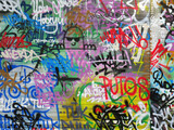 Fototapeta Paryż - Colorful graffiti on walls at the beach