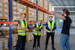© Wosunan - Portrait of worker in an auto parts warehouse, Encourage each other after completing tasks and finishing the day.
