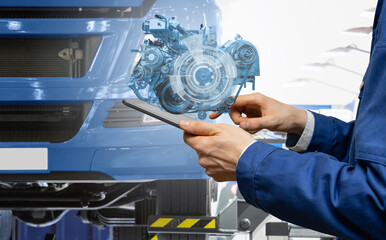 Poster - Serviceman repairing a truck using augmented reality application.	