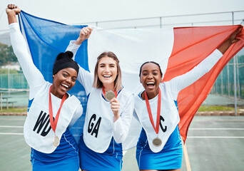 Wall Mural - Netball winning portrait, flag and sports team celebration, excited or celebrate award winner, competition victory or game. France group success, teamwork achievement or athlete happy for prize medal