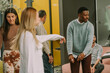 © qunica.com - Happy multiracial business people dancing at the office